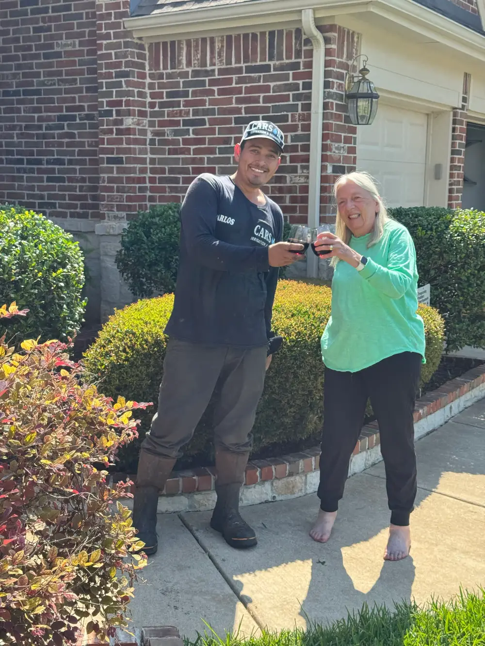 Carson tech celebrating with happy client after job completion